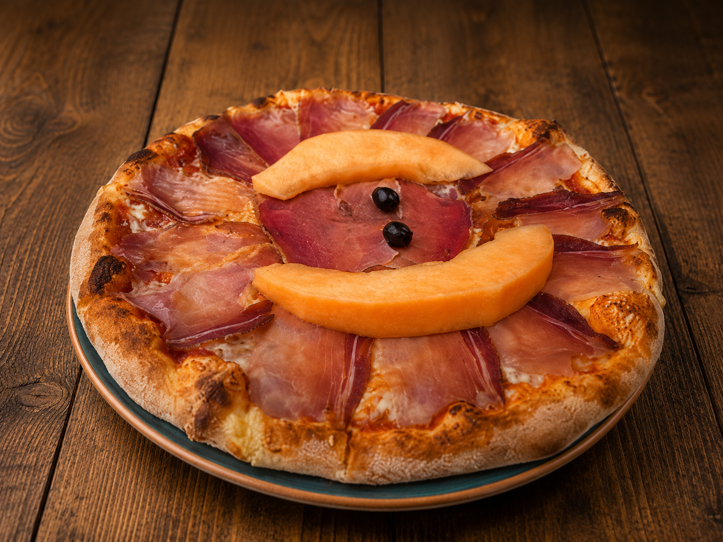 Pizza with prosciutto and melon